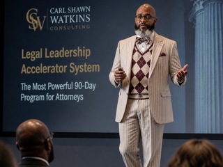 Carl Shawn Watkins presenting the Legal Leadership Accelerator System to a live audience